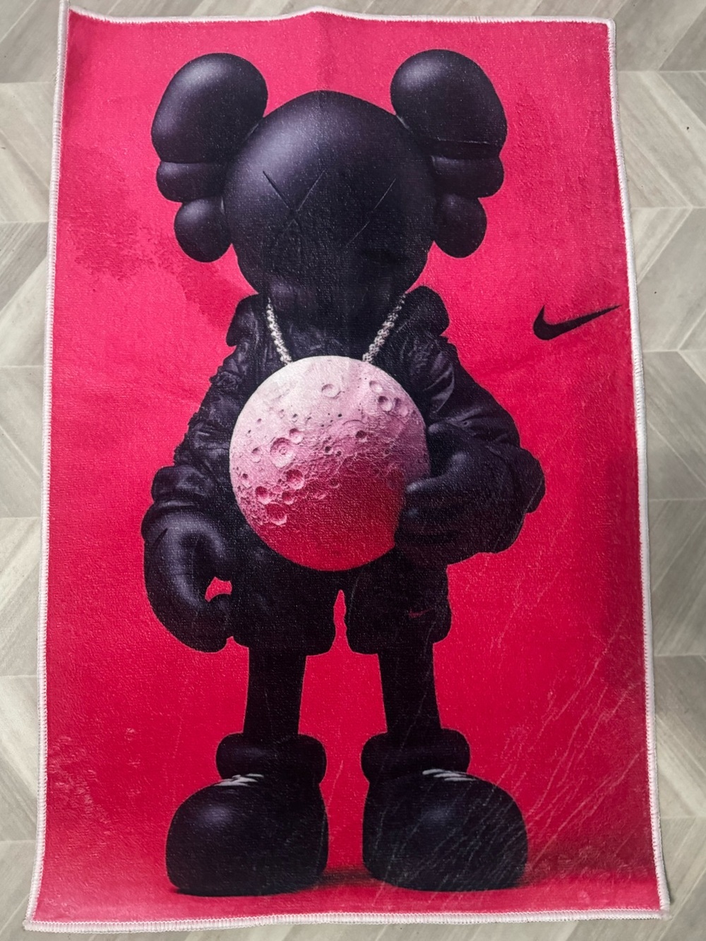 Nike Pink Graphic Rug/Wall Decor with Black KAWS-Style Figure